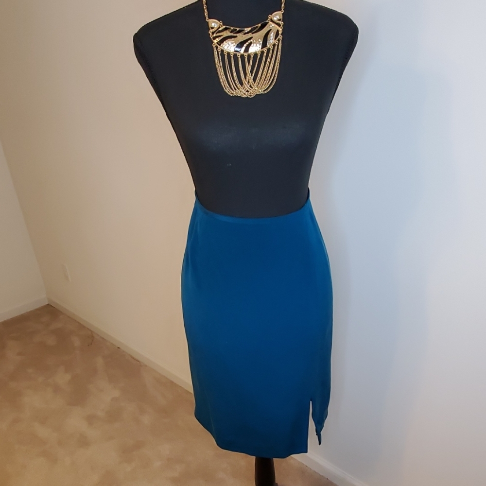 100% Silk  teal skirt lined with side split